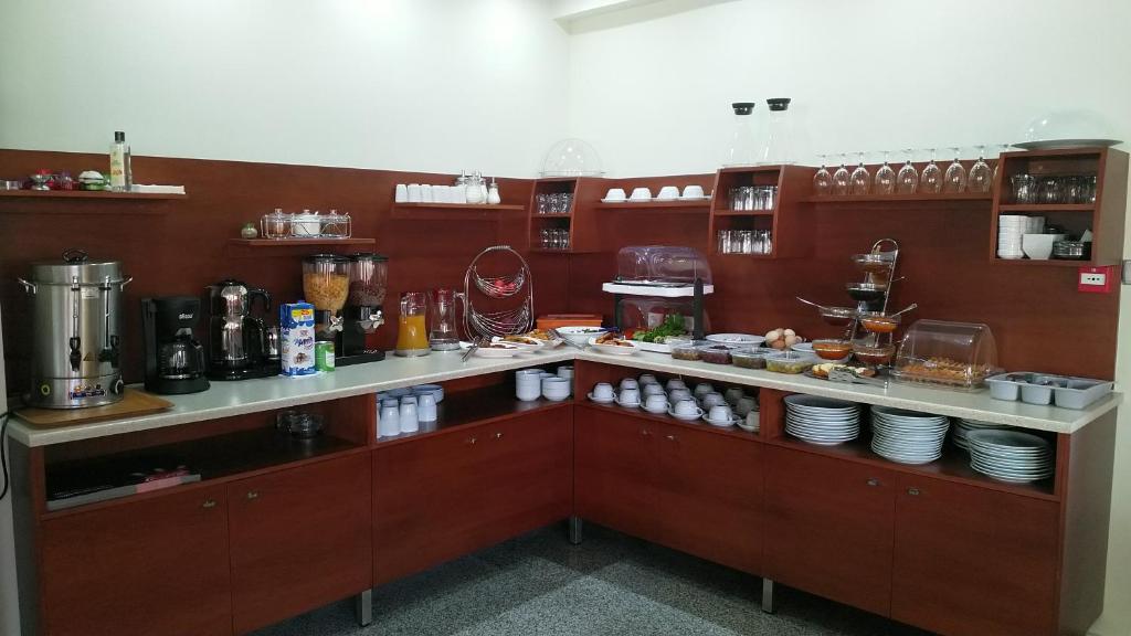 Kuchyň nebo kuchyňský kout v ubytování Marie Hotel