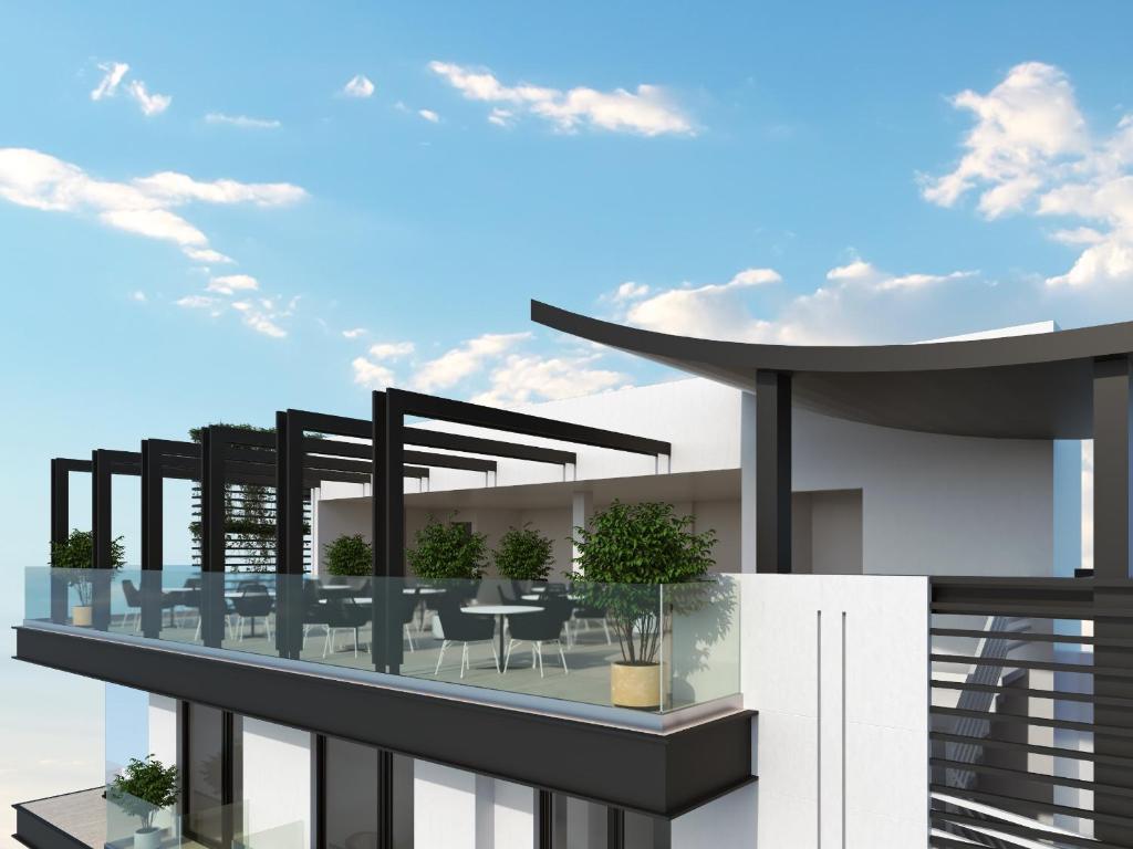 an architectural rendering of a building with a balcony at Maralia Hotel in Nicosia