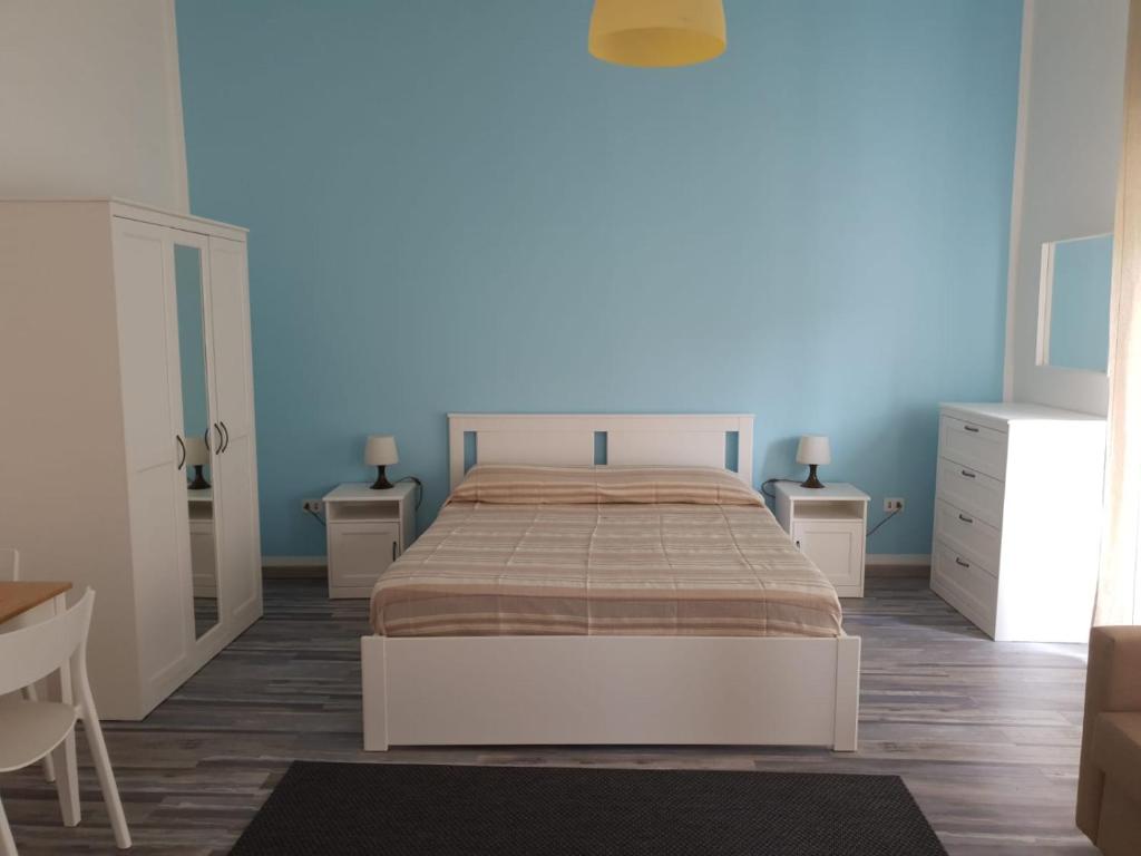 Postel nebo postele na pokoji v ubytování Lipari Suite Apartament