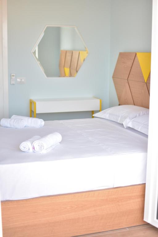 Postelja oz. postelje v sobi nastanitve Airen Hotel Velipoje