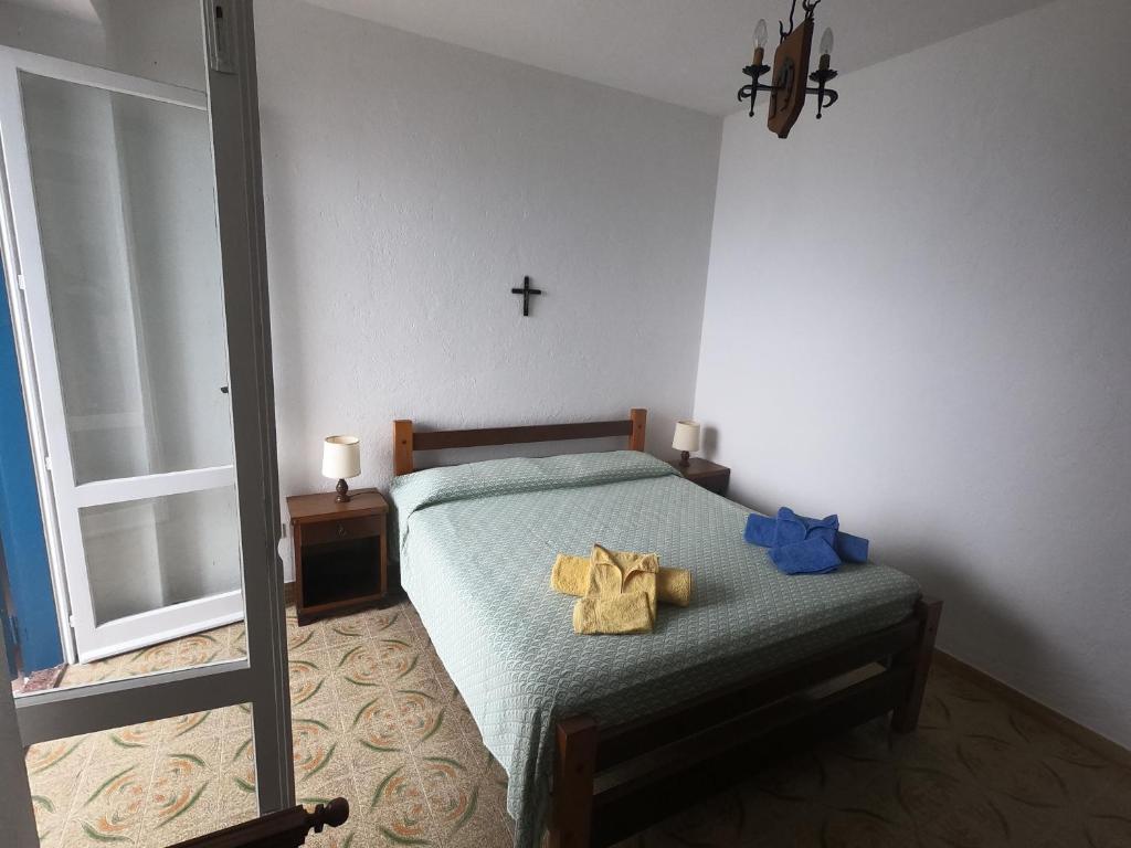 Postel nebo postele na pokoji v ubytování Residenza Gherly
