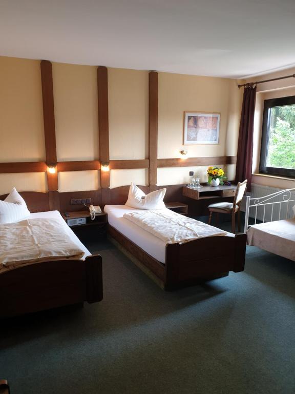 Heidehotel Anna - Dreibettzimmer