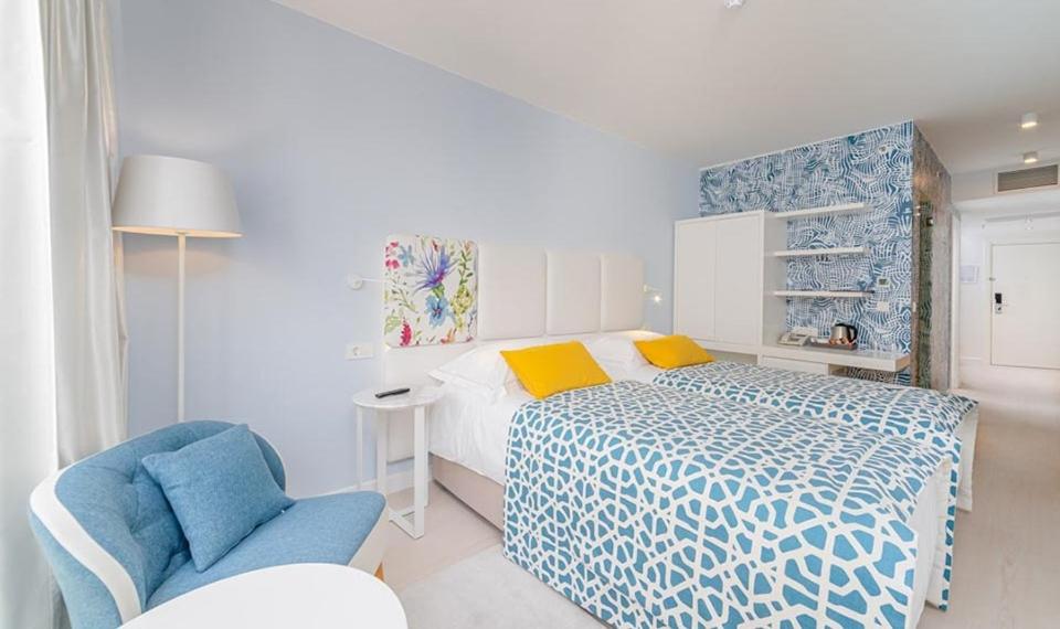 Posteľ alebo postele v izbe v ubytovaní Amadria Park Family Hotel Jakov