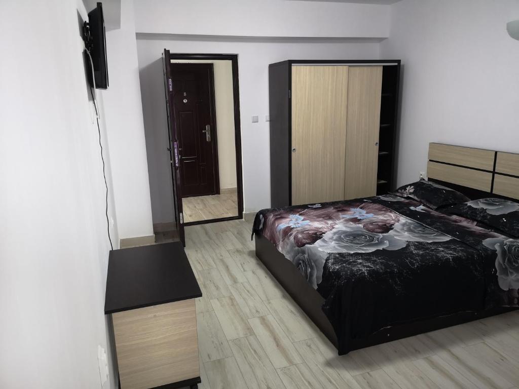 Postel nebo postele na pokoji v ubytování Vila Axel
