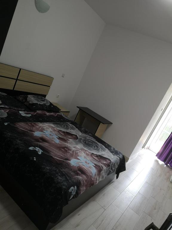 Postel nebo postele na pokoji v ubytování Vila Axel