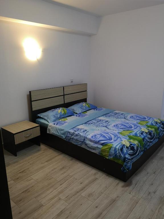 Postel nebo postele na pokoji v ubytování Vila Axel