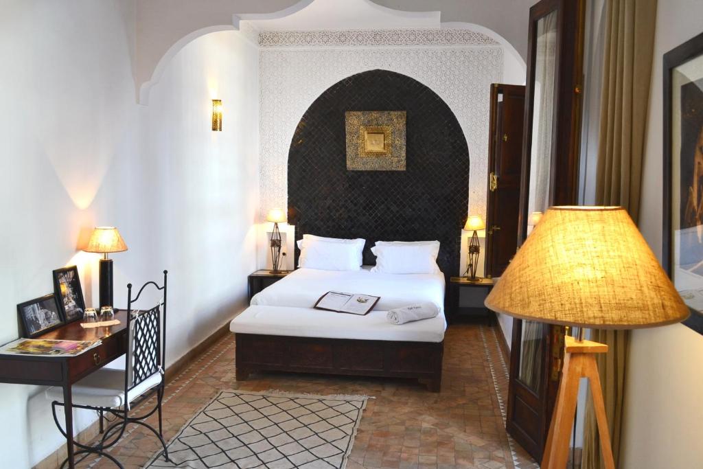 En eller flere senger på et rom på Riad Kasbah & Spa
