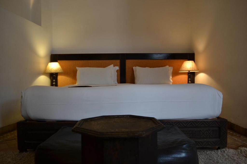 En eller flere senger på et rom på Riad Kasbah & Spa
