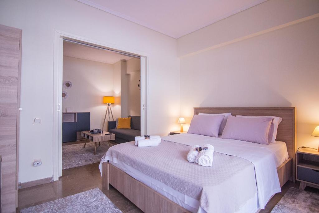 Ένα ή περισσότερα κρεβάτια σε δωμάτιο στο Comfort Mitropoleos Apartment