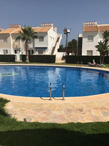 Bazén v ubytování Apartamento La Marina - VVMU057 nebo v jeho okolí