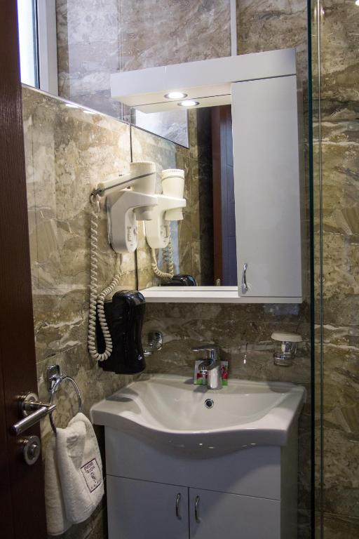 Koupelna v ubytování Hotel Skopje