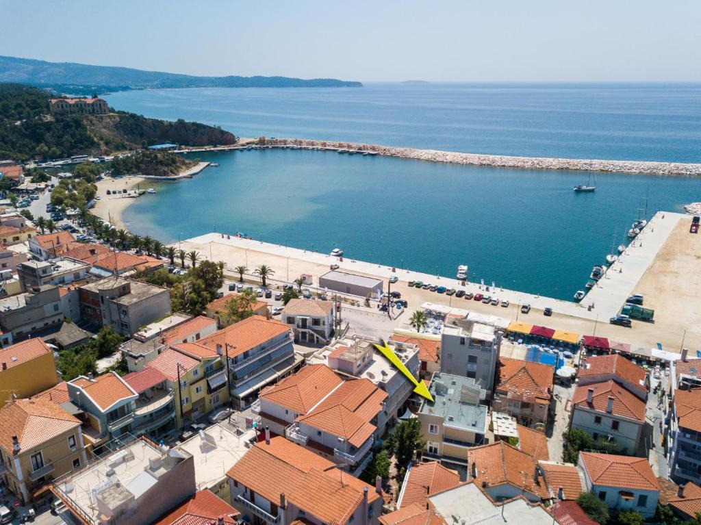 an aerial view of a town with a body of water at Studios & Apartments Elisabeta in Limenaria