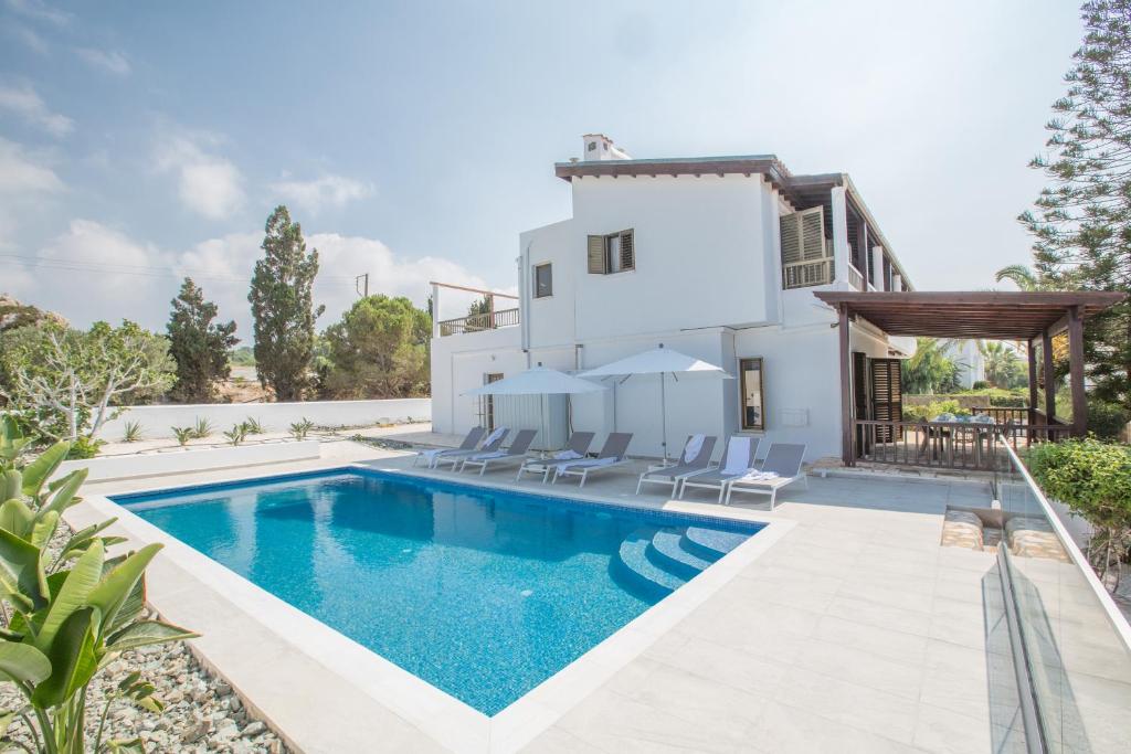 an image of a villa with a swimming pool at Rosie Villa in Ayia Napa