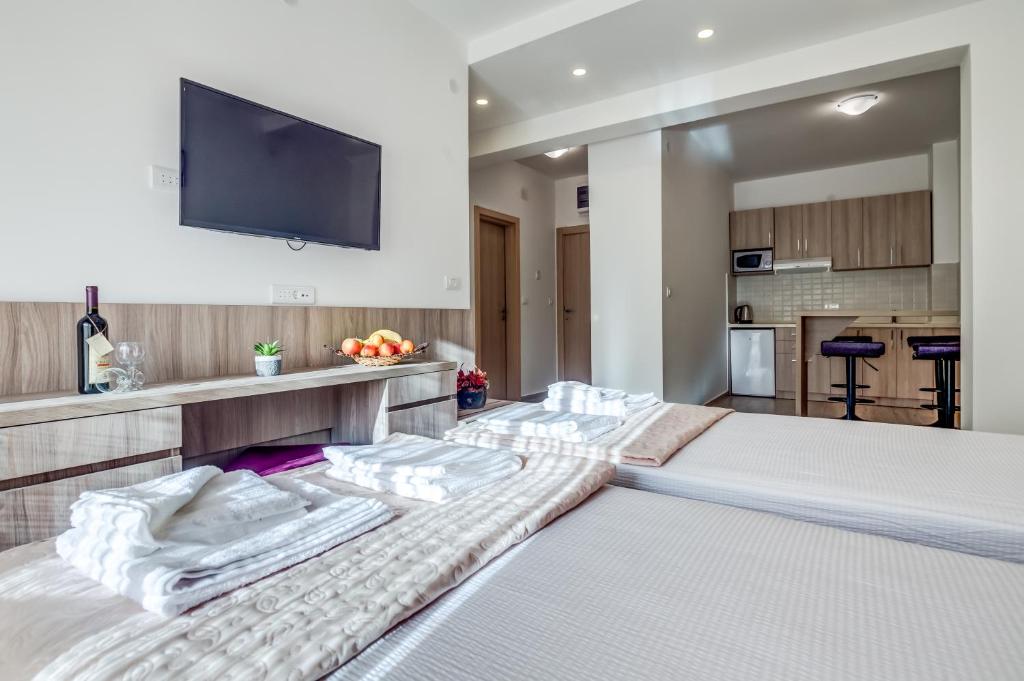 Kuchyň nebo kuchyňský kout v ubytování Adriatik Lux Apartments