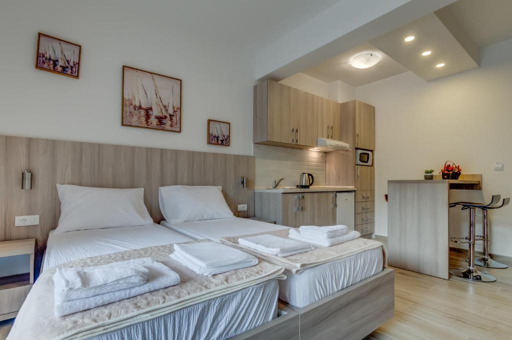 Postel nebo postele na pokoji v ubytování Adriatik Lux Apartments