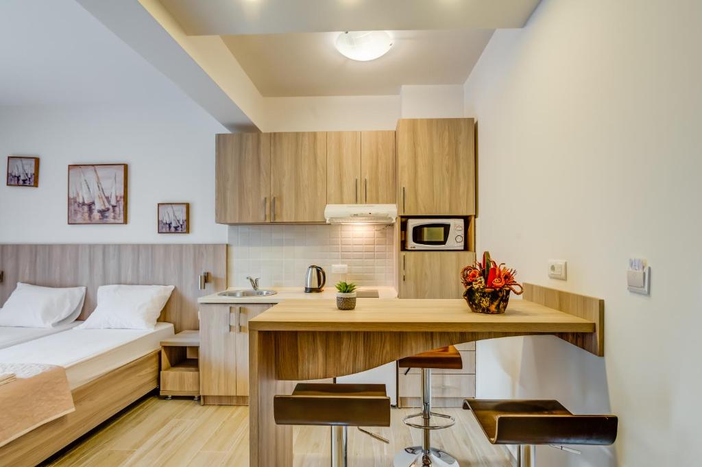 Postel nebo postele na pokoji v ubytování Adriatik Lux Apartments
