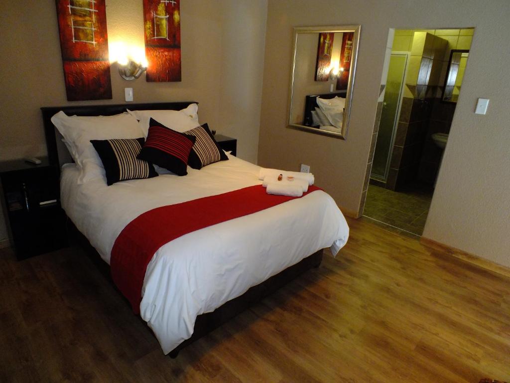 Posteľ alebo postele v izbe v ubytovaní Akweja Bed and Breakfast Accommodation