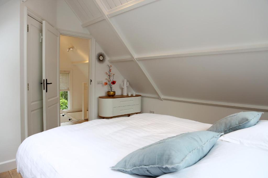 Postel nebo postele na pokoji v ubytování Sunny Guesthouse