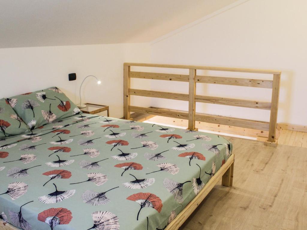 Кровать или кровати в номере La Dimora apartments