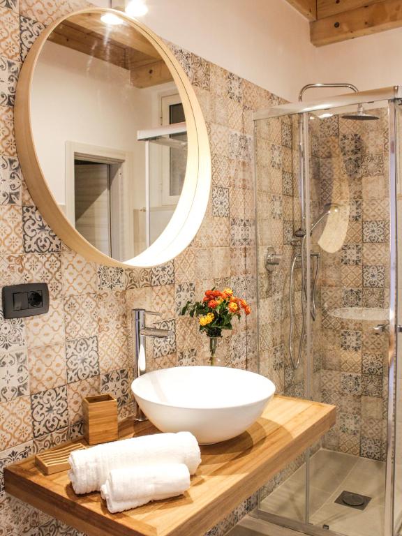 Ванная комната в La Dimora apartments