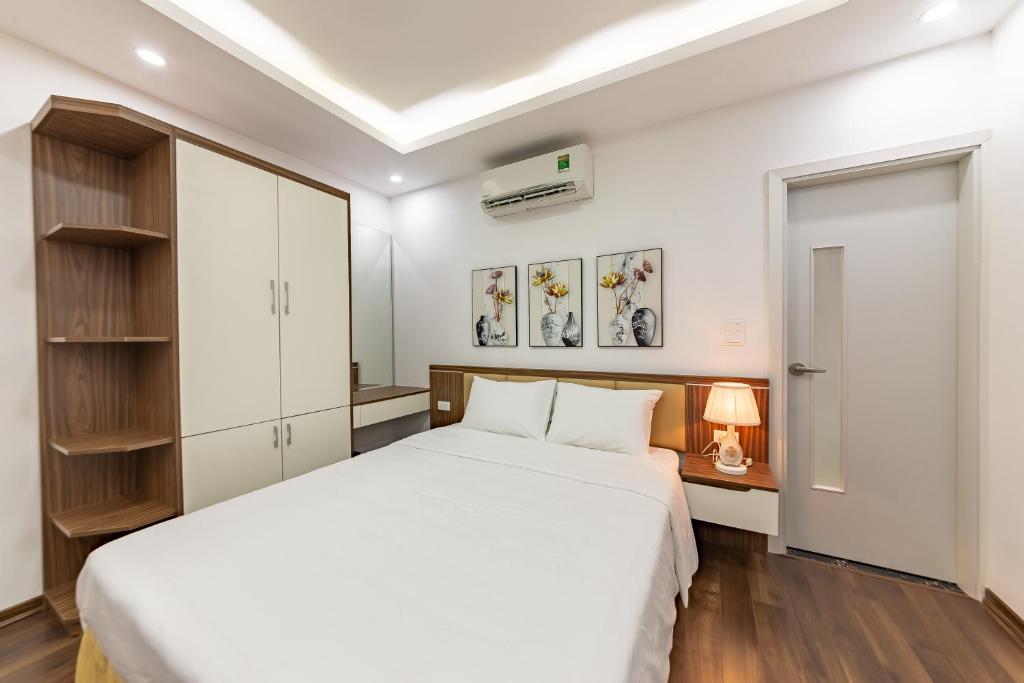 Postel nebo postele na pokoji v ubytování EVEREST HOTEL