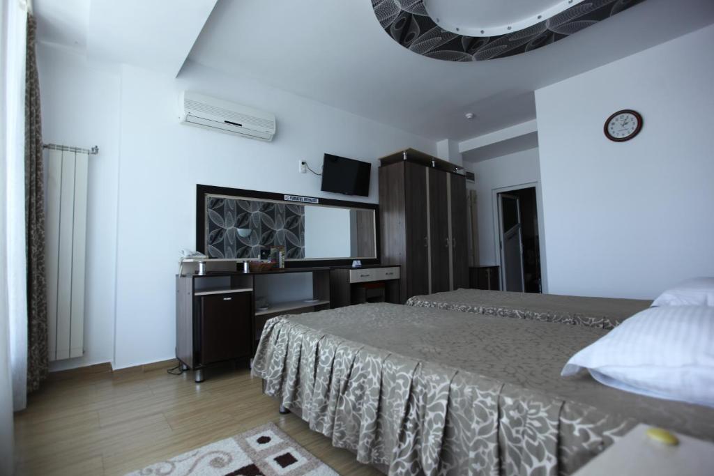 Postel nebo postele na pokoji v ubytování Motel Nordiana