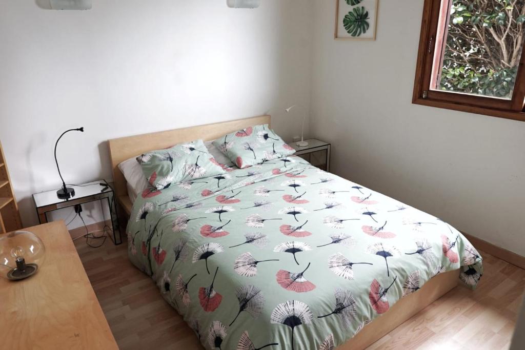 Łóżko lub łóżka w pokoju w obiekcie La Favorita