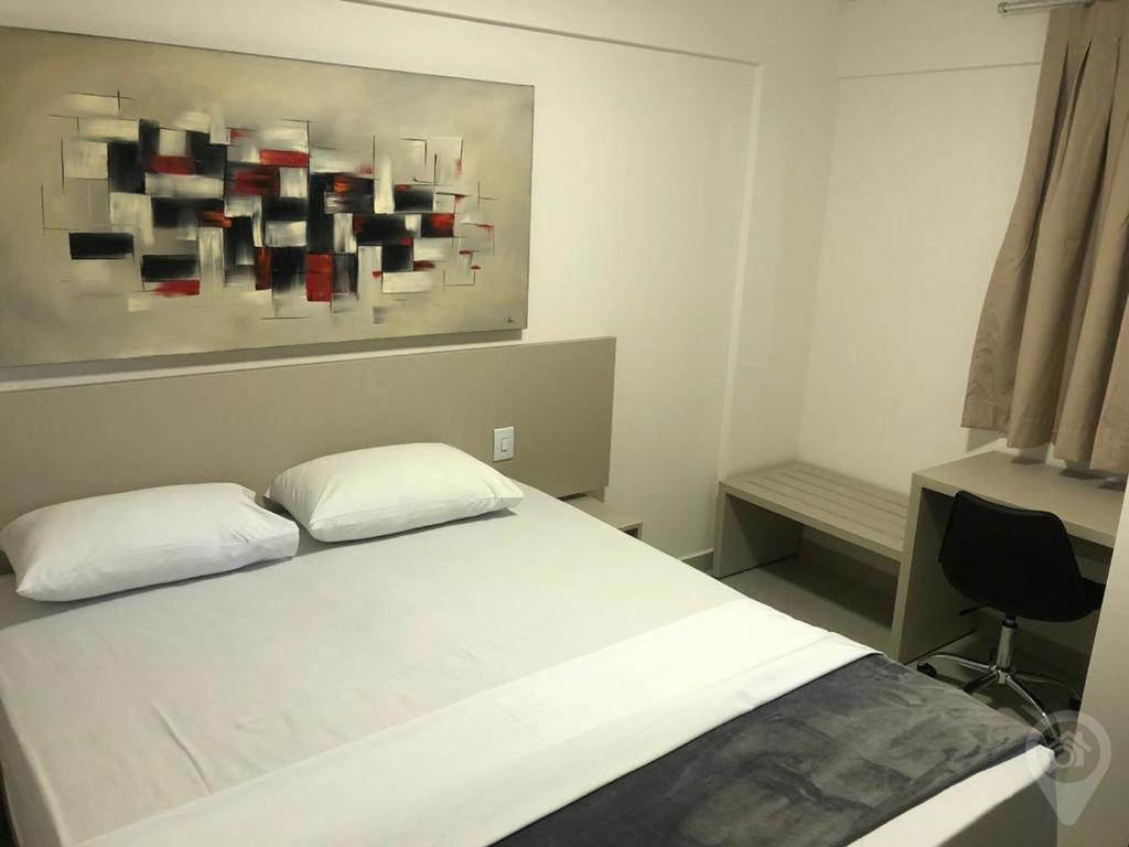 Cama ou camas em um quarto em Evian thermas Residence