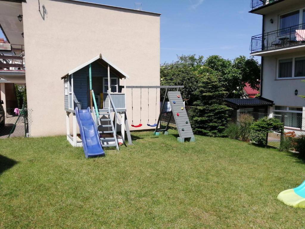 Vonkajšia záhrada v ubytovaní Rellim Apartamenty