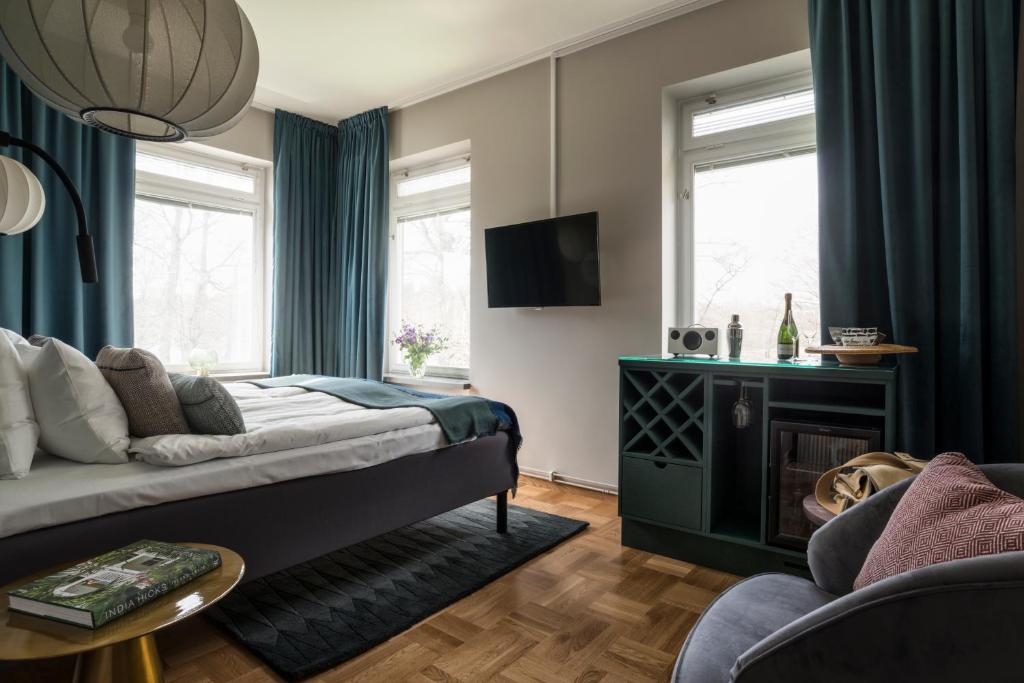 TV a/nebo společenská místnost v ubytování Näsby Slott