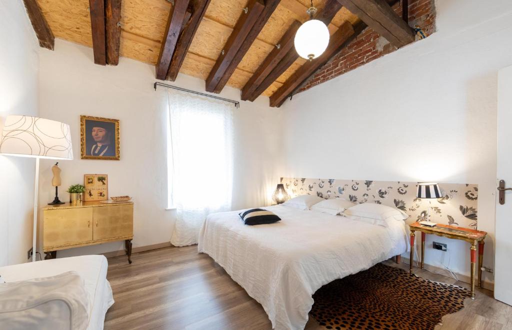 Ένα ή περισσότερα κρεβάτια σε δωμάτιο στο Casa Morgana