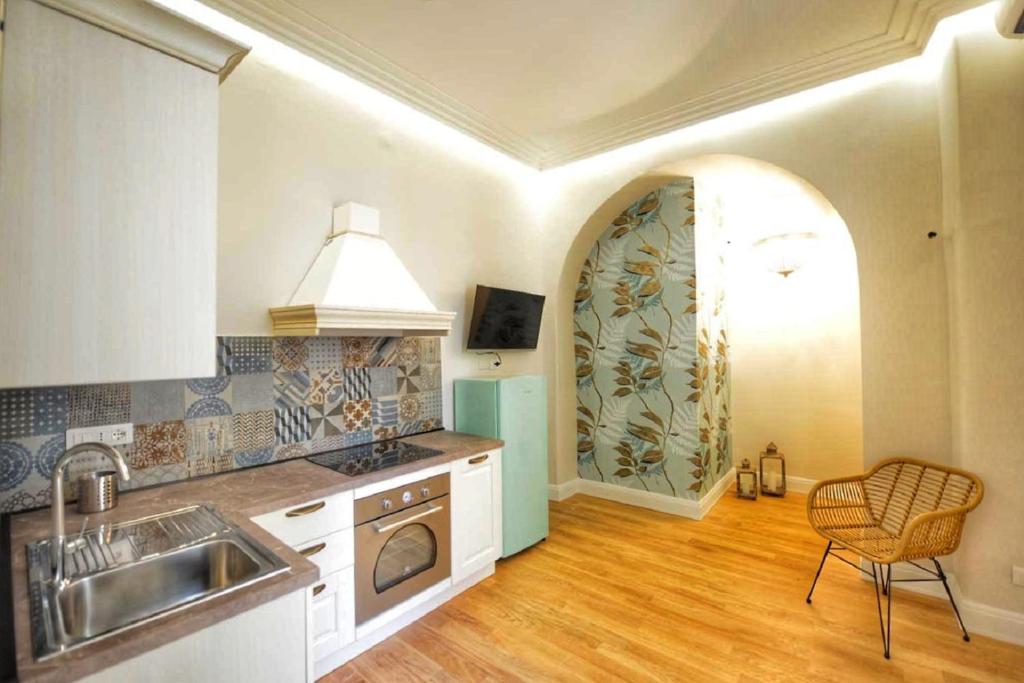 Kuchyň nebo kuchyňský kout v ubytování Domus D'Angelo B&B