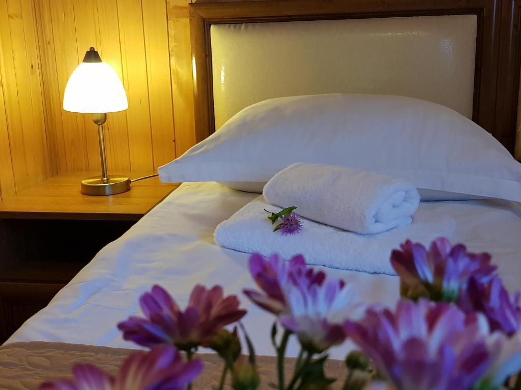 Postel nebo postele na pokoji v ubytování Villa Nova