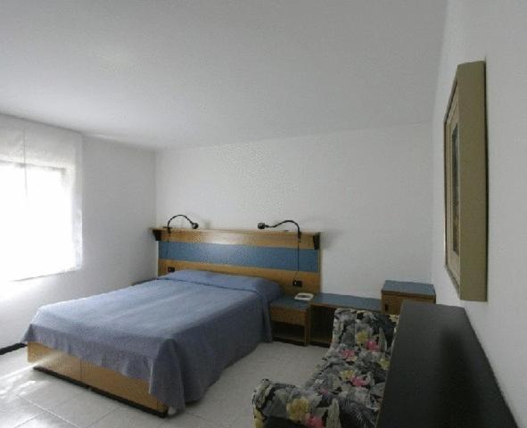 Postel nebo postele na pokoji v ubytování Albergo Alla Torre