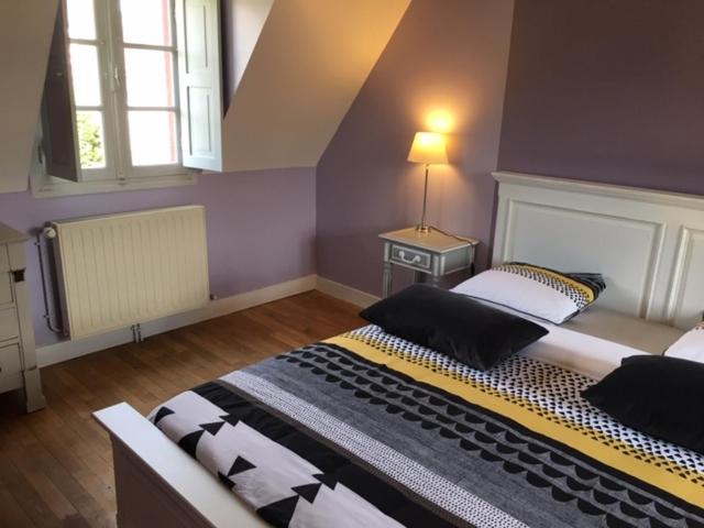 Katil atau katil-katil dalam bilik di Gite de la petite masse