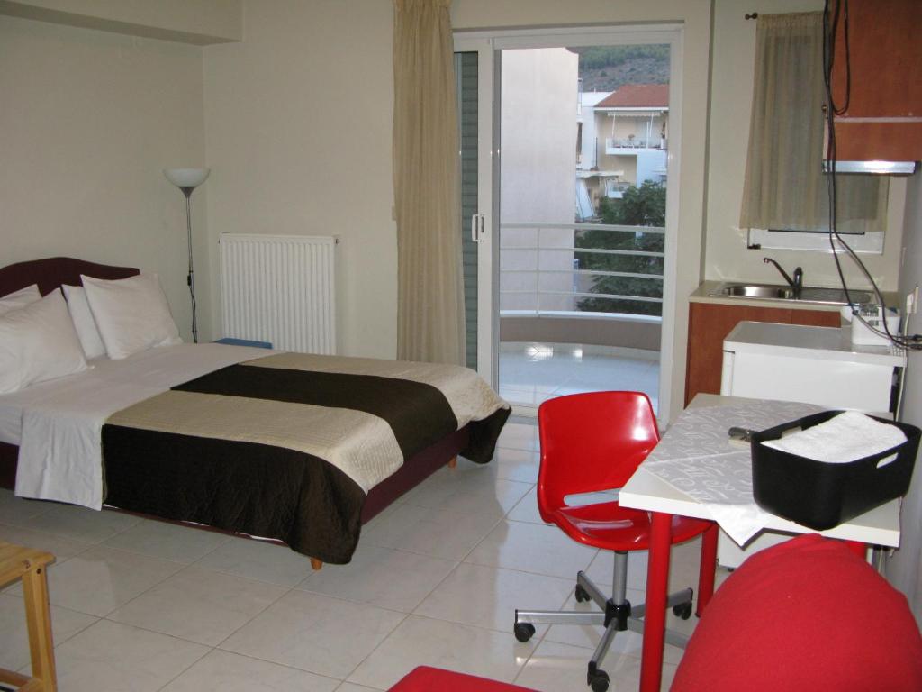 Postel nebo postele na pokoji v ubytování ALEXANDER Rooms