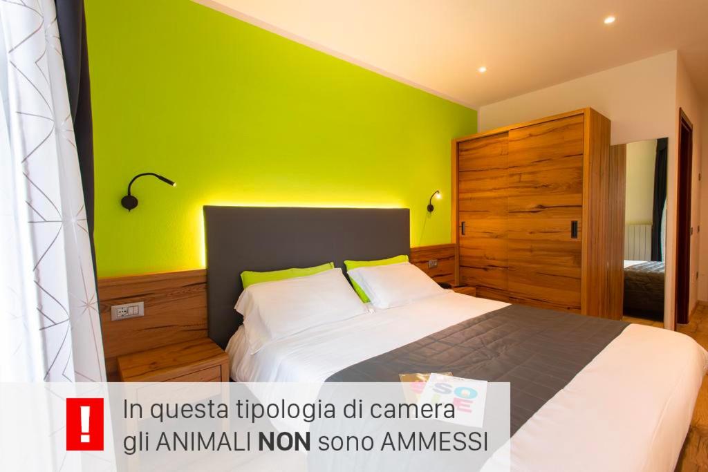 Postel nebo postele na pokoji v ubytování Hotel Angelo
