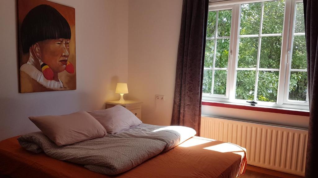 Postel nebo postele na pokoji v ubytování Selfoss Hostel