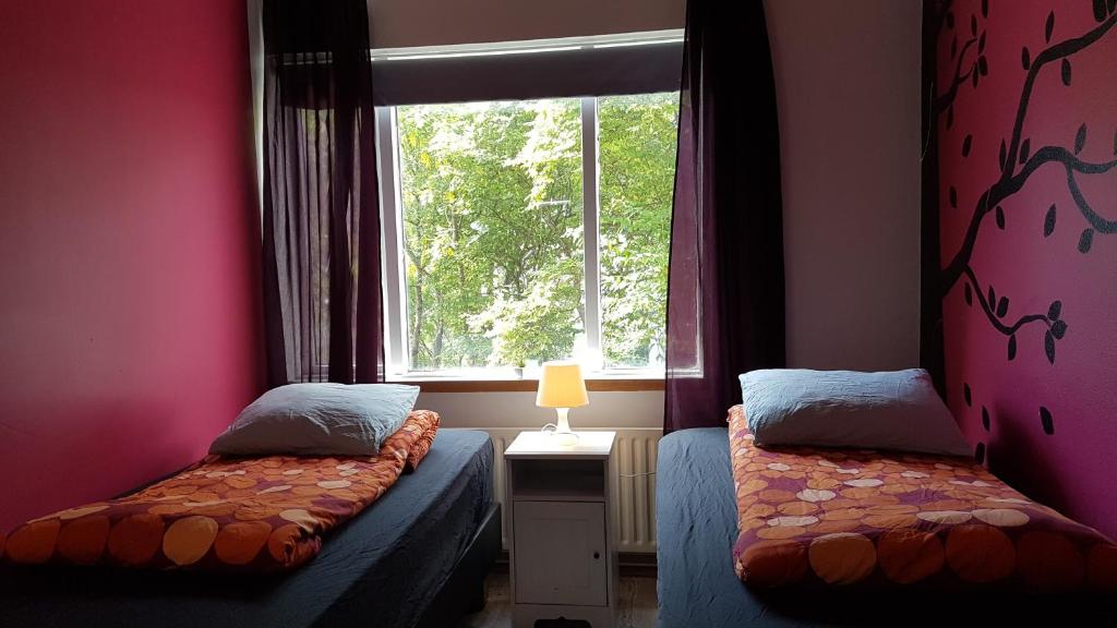 Postel nebo postele na pokoji v ubytování Selfoss Hostel