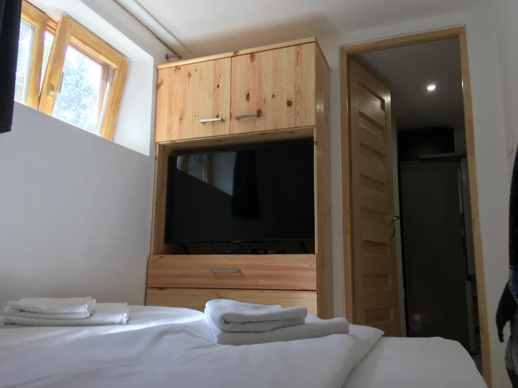 Postel nebo postele na pokoji v ubytování Modern Apartman Deluxe