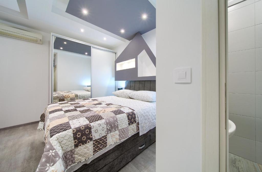 Posteľ alebo postele v izbe v ubytovaní Luxury VALL Apartment