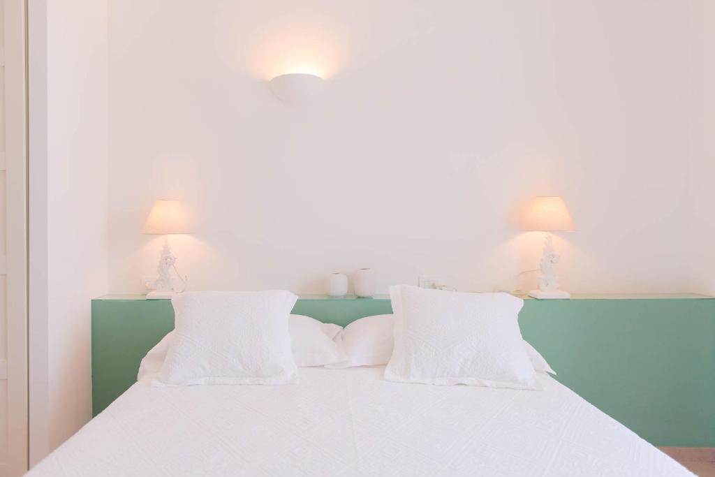 Postel nebo postele na pokoji v ubytování B&B Casale Savini