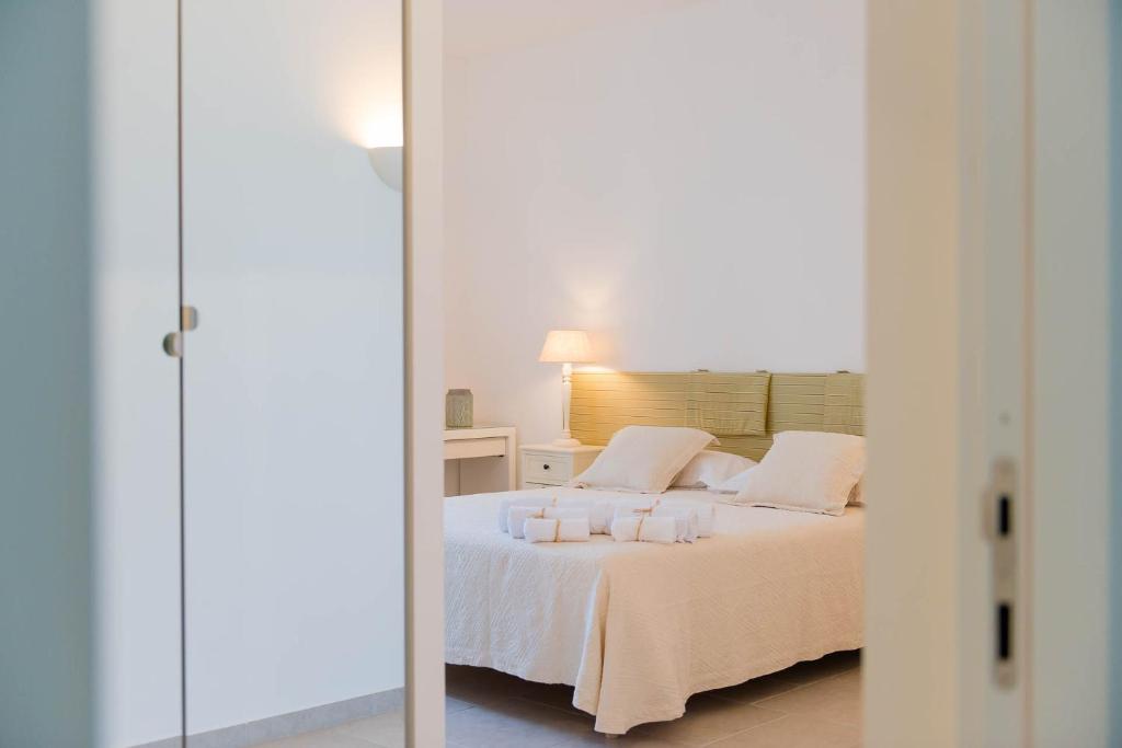 Postel nebo postele na pokoji v ubytování B&B Casale Savini