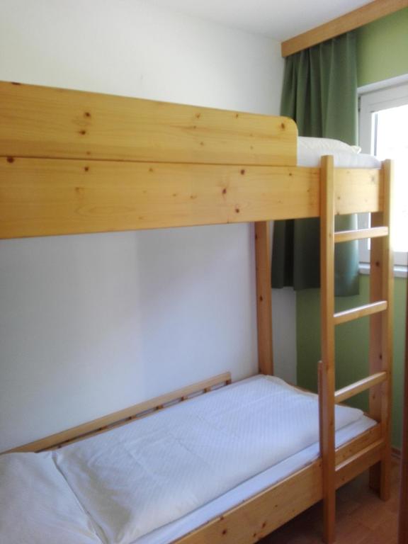 Postel nebo postele na pokoji v ubytování Familiengasthof Zirmhof