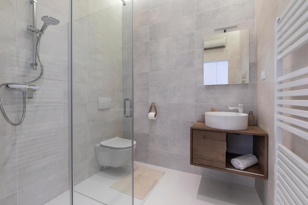 Twins Idola Apartments - 12