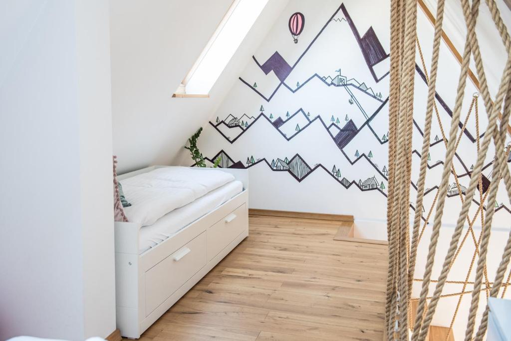 Posteľ alebo postele v izbe v ubytovaní Apartamenty Gubałówka