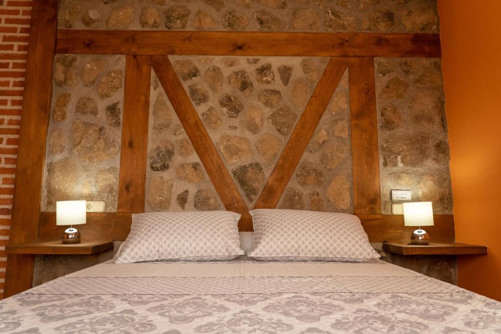 Posteľ alebo postele v izbe v ubytovaní El Mirador de la Atalaya