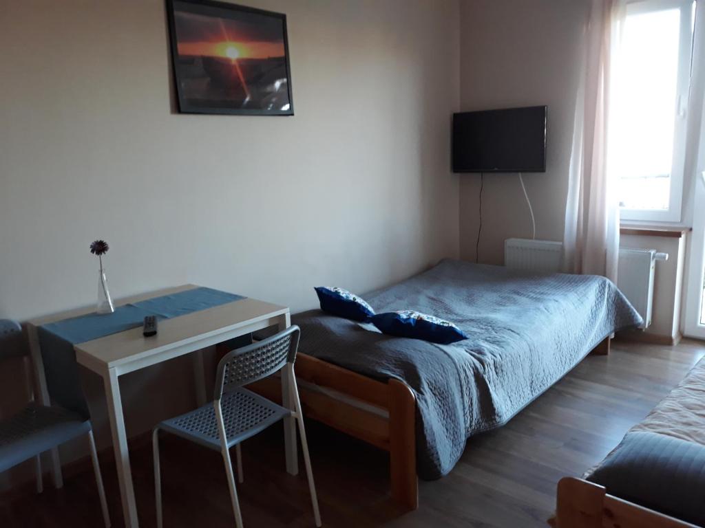 Posteľ alebo postele v izbe v ubytovaní Pokoje Gościnne Anastazja