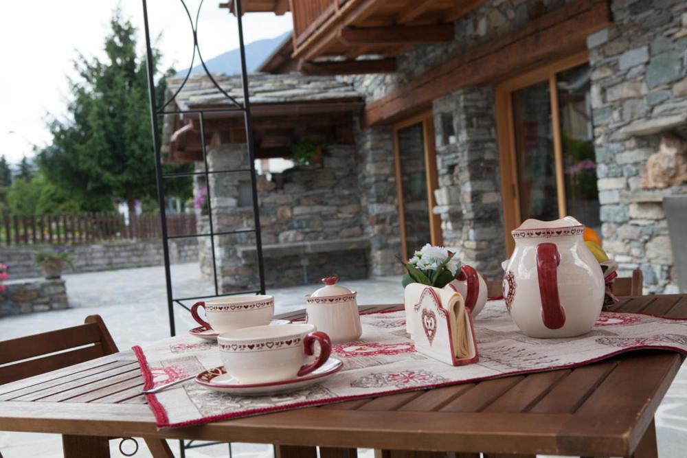Patio alebo iná vonkajšia časť ubytovania Relais du Berger
