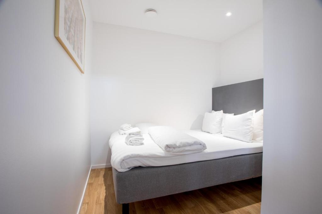 Postel nebo postele na pokoji v ubytování ApartDirect Sundbyberg